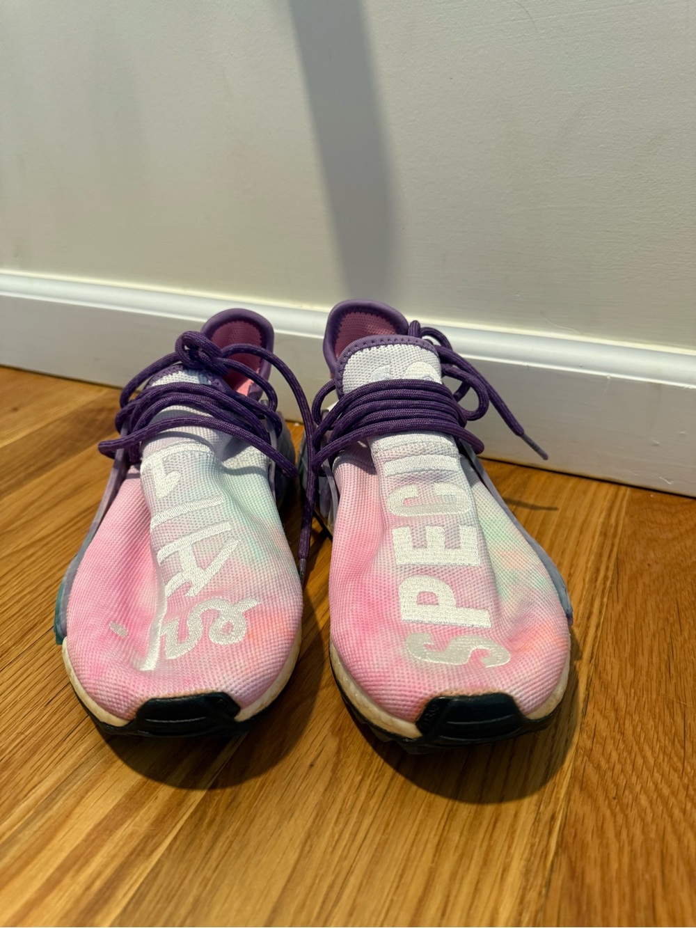 NMD human race trail x Pharrell Holi festival pink glow sneakers